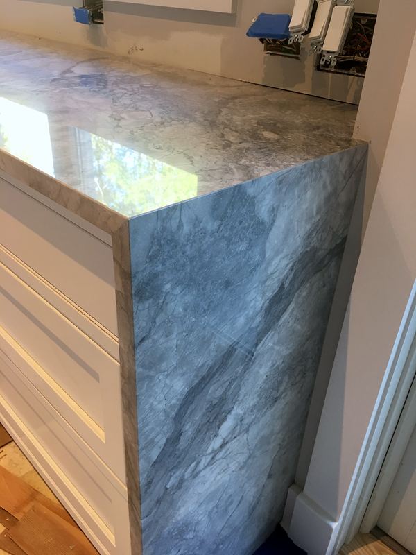 Waterfall stone countertop edge fabricated by AGR